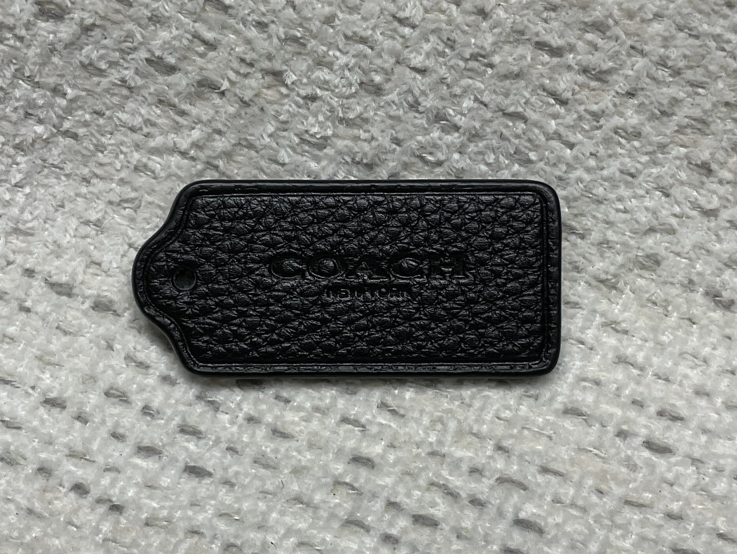 Coach Black textured Tag