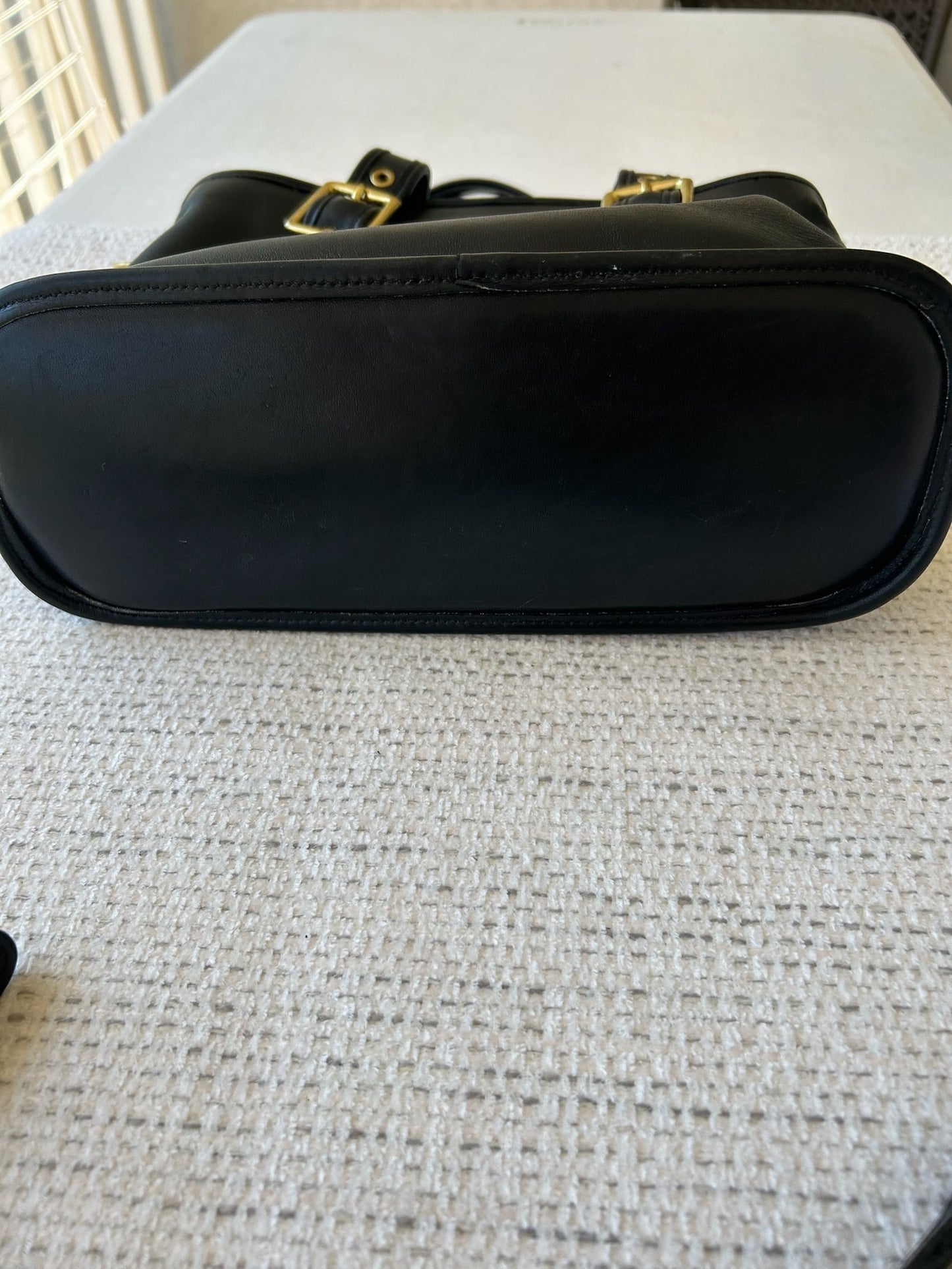 Black Leather Handbag with Gold Accents