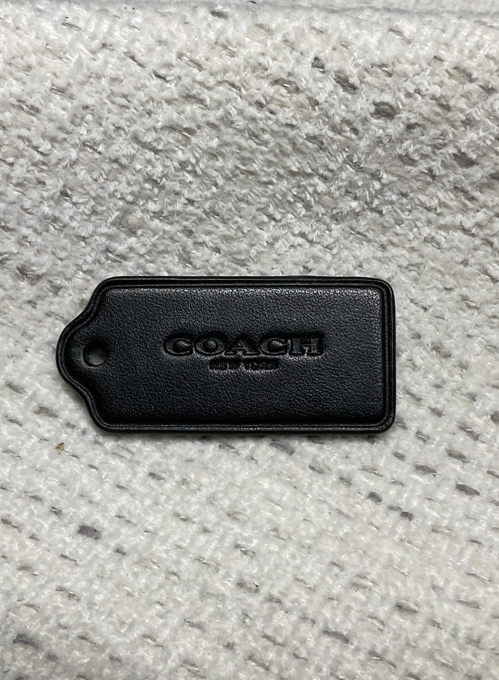 pre-owned authentic coach leather hang tag untextured front view