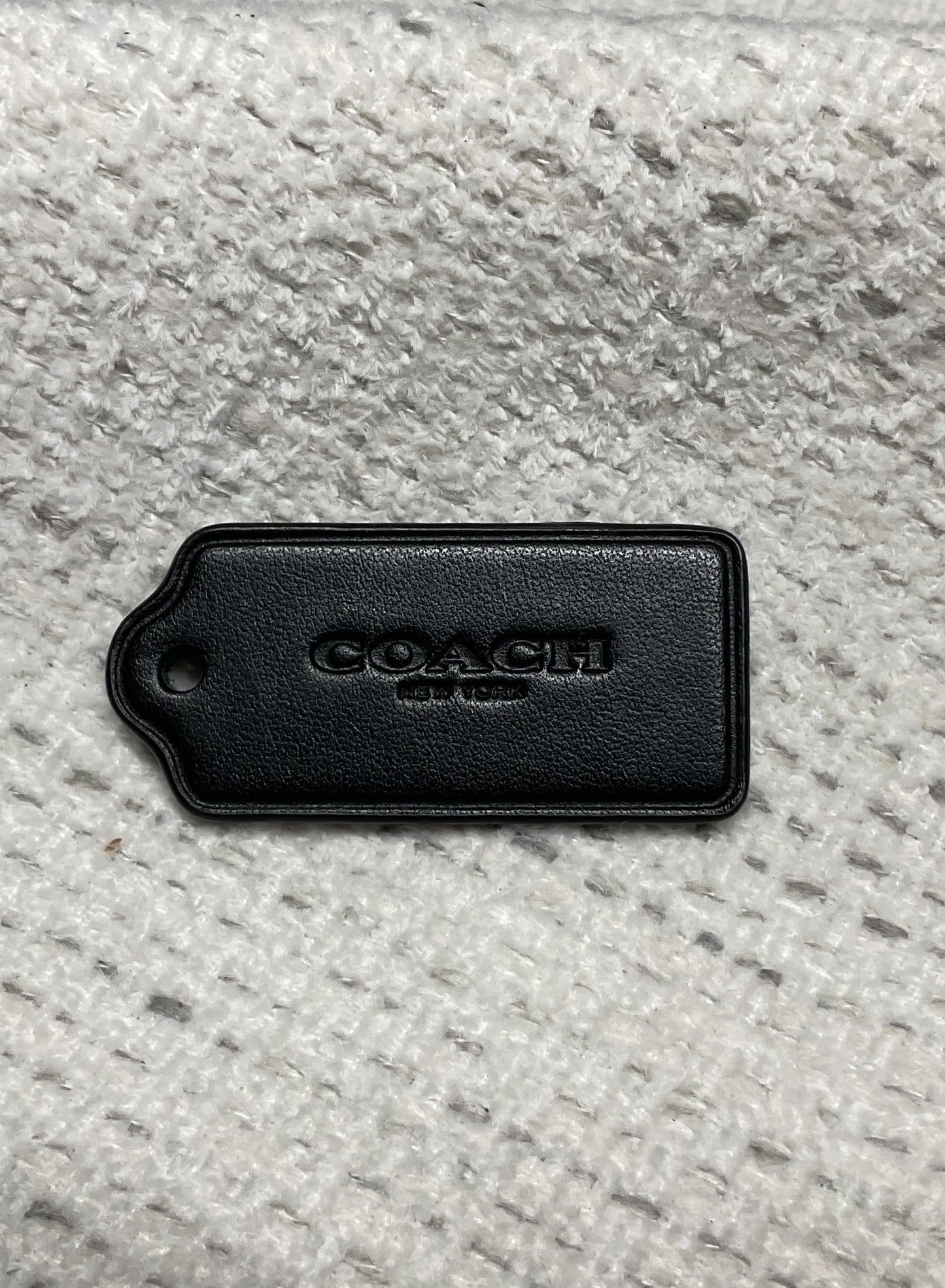 Black Coach Tag