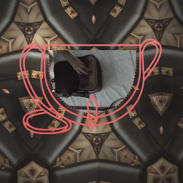 video of women restoring a brown vintage coach bag, with her hands with happy music playing in the background (url: Music from #Uppbeat
https://uppbeat.io/t/ill-kitchen/food-for-thought)