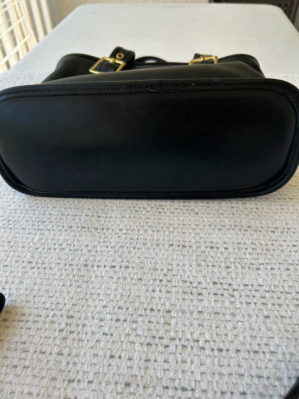 Black Leather Handbag with Gold Accents