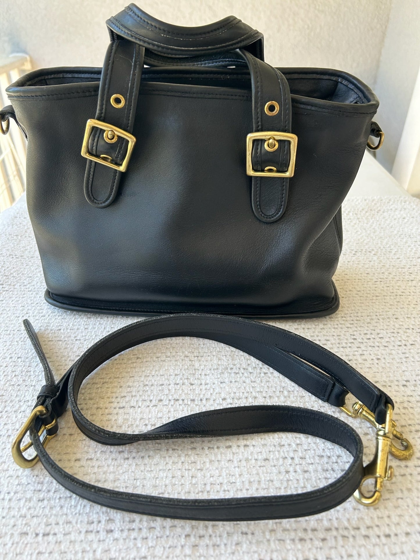Black Leather Handbag with Gold Accents