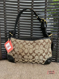 Vintage Coach brown/tan/black Bleecker Signature C Bag