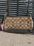 Vintage Coach brown and tan Demi Pouch