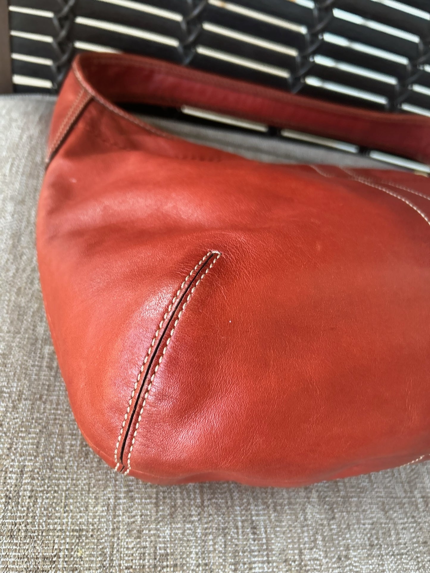 corner view of the bag showing fine stitching 